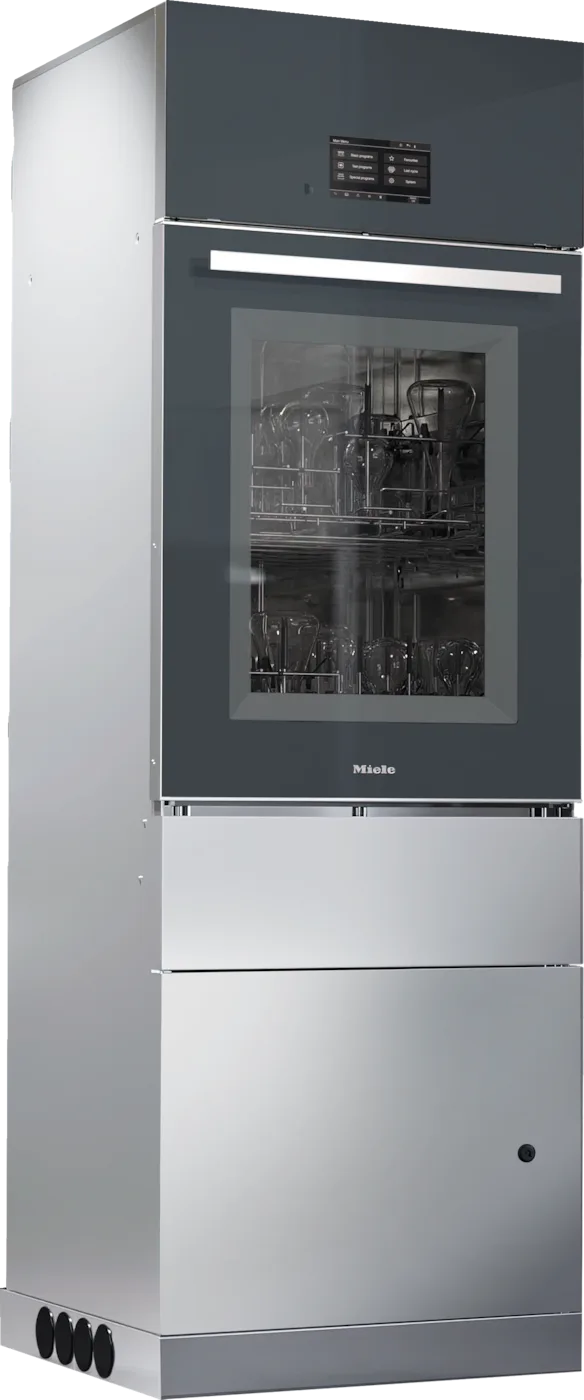 Fristående Miele PLW 7111 labbdiskmaskin i rostfritt stål, smal och hög, med lyftlucka i glas, touchdisplay upptill och belyst diskutrymme fyllt med laboratorieglas, uppställd på rullbar sockel.